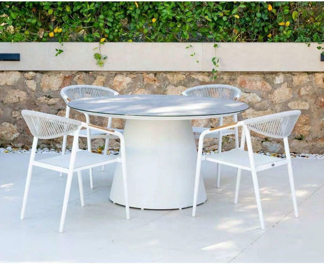 Comedor de terraza Haití con mesa redonda y sillones