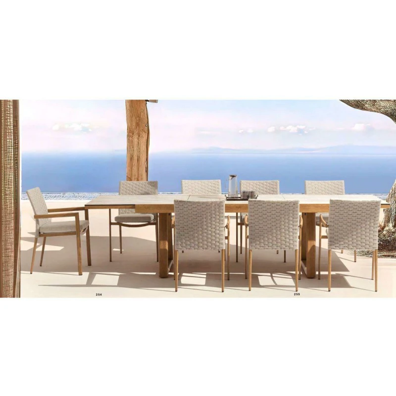 Comedor exterior con mesa extensible piedra y sillones trenzados - Imagen 3